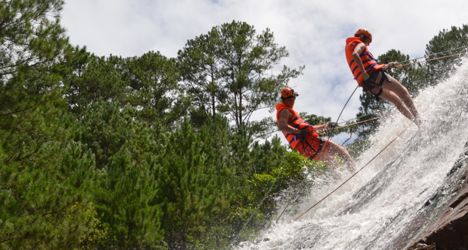 swinging line crossing the waterfalls in Dalanta Dalat