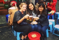Communicate to free tour guides to explore beer street Hanoi
