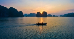 Sunrise on Bai Tu Long Bay in Vietnam Package Holiday.