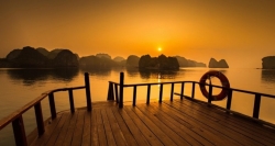 Enjoy the sunset scenery on board when the junk cruise through Lan Ha Bay