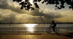 Experience the mesmeric sunset moment in your Hanoi sightseeing