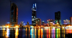 Saigon River is twinkle with thousand lights for your luxury dinner for the best Vietnam travel package 2 week itinerary