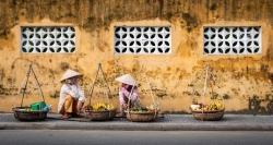 Vendors in Hoian's Old Quarter - a beauty of the ancient commercial port