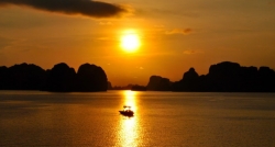 Try to catch the sunset on Halong Bay in your Vietnam Cambodia Laos Tour