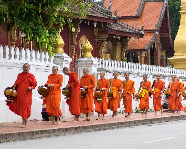 Come to Luang Prabang to experience its mendicant culture in early morning
