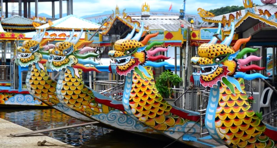 Dragon boats will take you stream along the Perfume River.