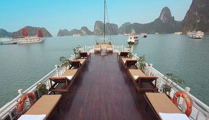 Cruising through the limestone cliffs and emerald waters of Ha Long Bay