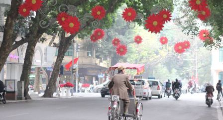 Cyclo is a familiar thing that you can see in the 36 old streets of Hanoi