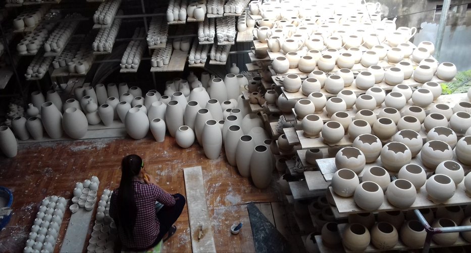 Bat Trang Ceramic Village is famous with the skillful pottery products
