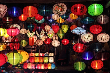 Hoian by night is likely a brighten girl in the colors of lantern