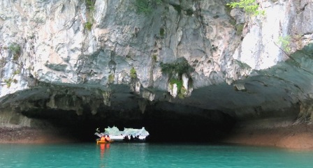 Kayaking in the area of Bright and Dark Cave in the journeys of Halong Cruise