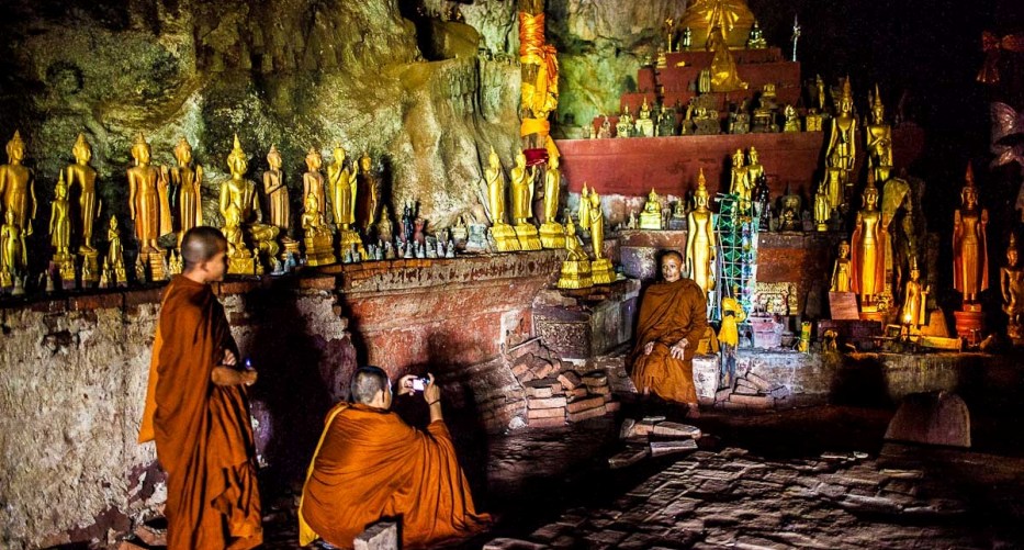 The monks in Pak Ou Caves, Luang Prabang