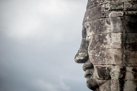 The impressing face in Angkor Thom, you can see in Vietnam Cambodia Laos tour.