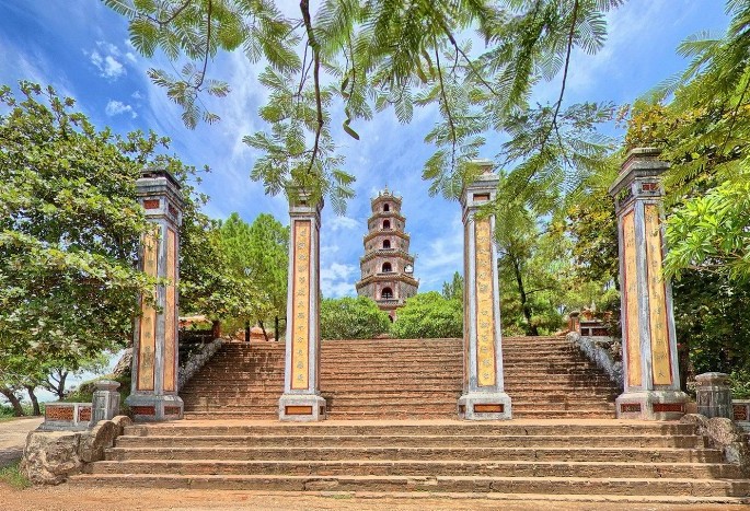 Thien Mu Pagoda in the stream of poetic Huong River for your Thailand Cambodia Vietnam tour.