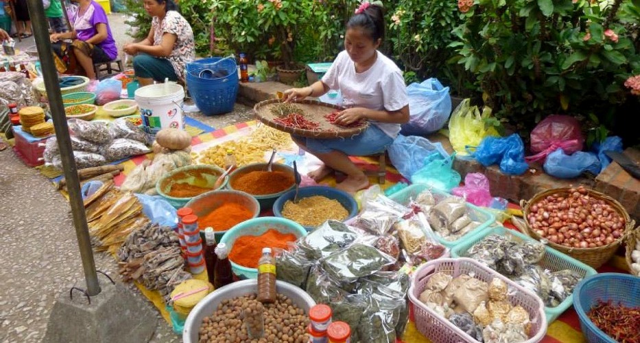 Explore the local markets in Luang Prabang before departure