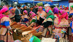 Ethnic Woman wearing colorful traditional clothes in Bac Ha market