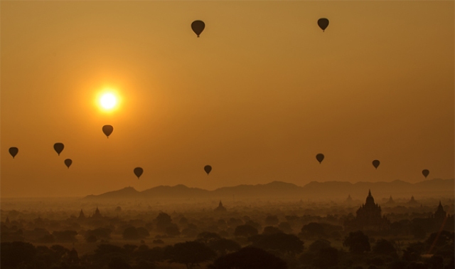 Balloons are released to catch the first sunlight