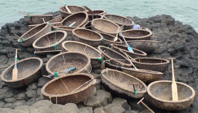 The small circle boats of local fishermen in Da Dia Reef, Phu Yen