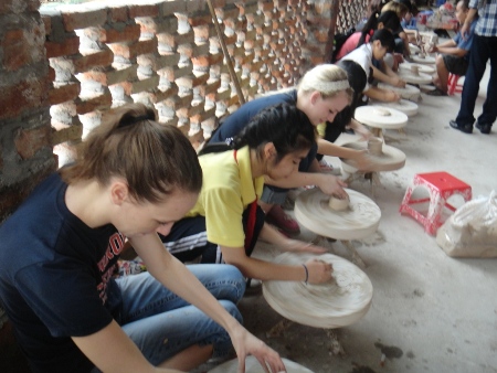 Try making your first pottery cup in Bat Trang village.