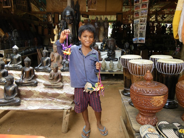 a stall sells sculptural items in Siem Reap