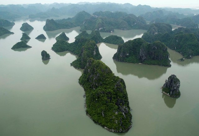 Halong Bay, with thousand of limestone Islands looks like the place of landing dragons
