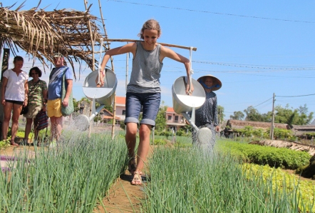 dropping water as a farmer in Tra Que village